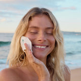 SAMI Organic Cotton & Bamboo Reusable Rounds used on skin at the beach, reusable makeup remover pads for gentle cleansing and sustainable skincare routines