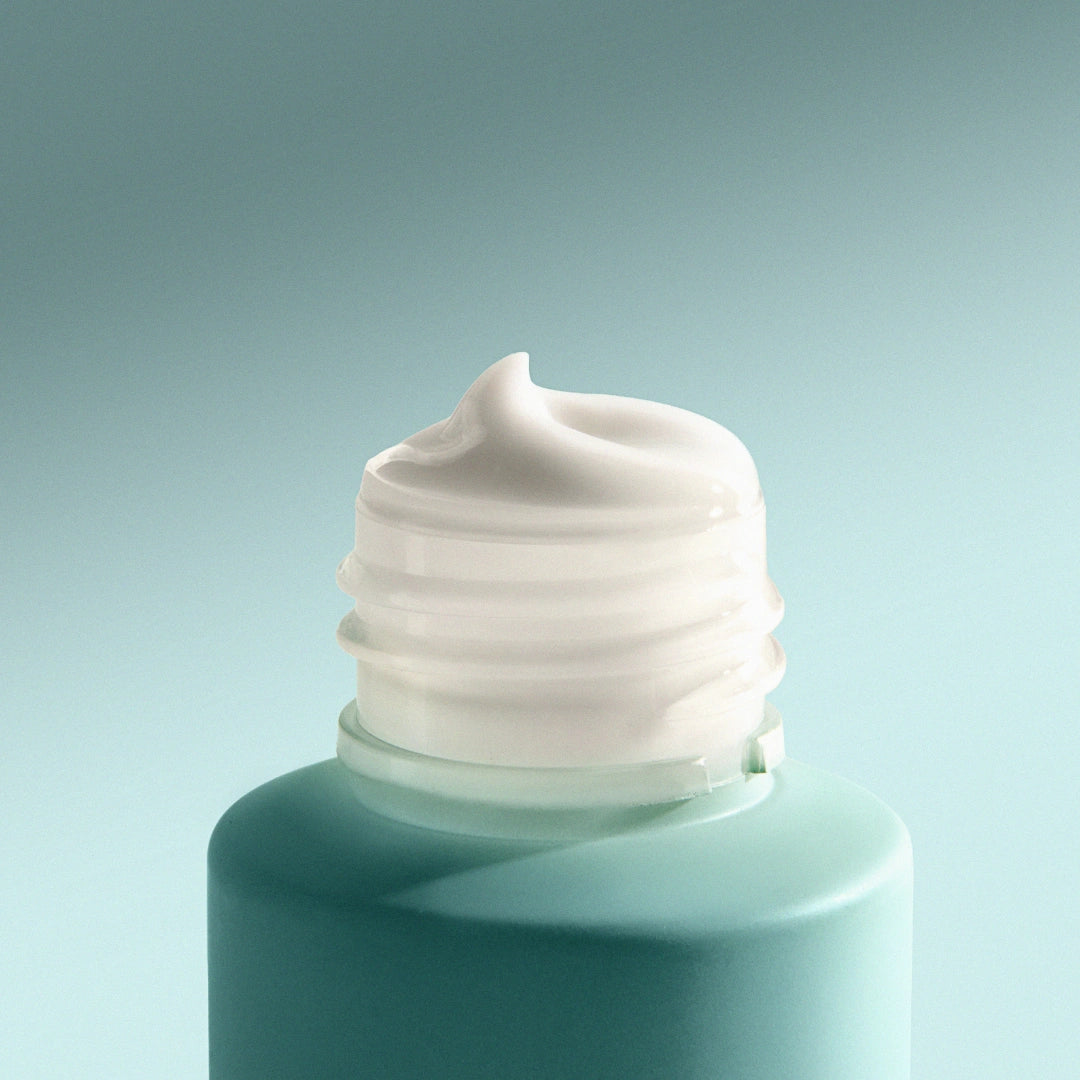 No rinse face cleanser creamy texture close up hydrating cream cleanser with hyaluronic acid smooth nourishing formula.
